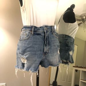 Light-wash, high-waist, distressed jean shorts